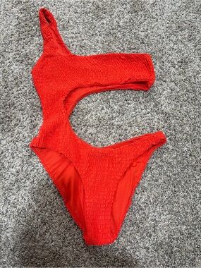 We wore what  orange One-Shoulder One-Piece Swimsuit with cut outs